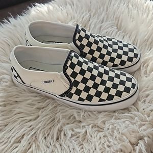 Vans black and white checker women's size 8 slip on canvas shoe.